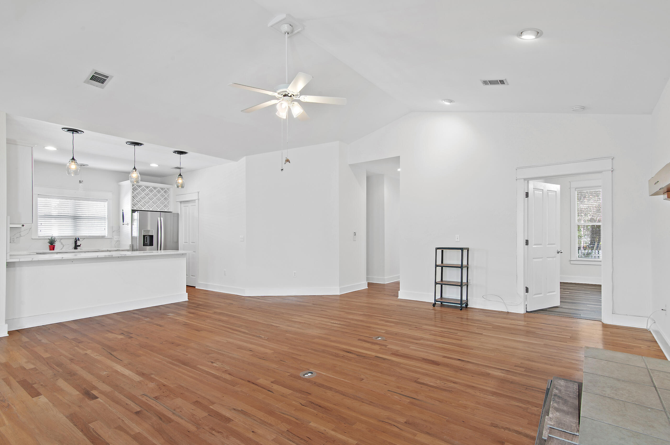 158 Cullman Avenue Santa Rosa Beach, FL 32459 - Photo 14 of 47 a view of a kitchen with wooden floor and a kitchen