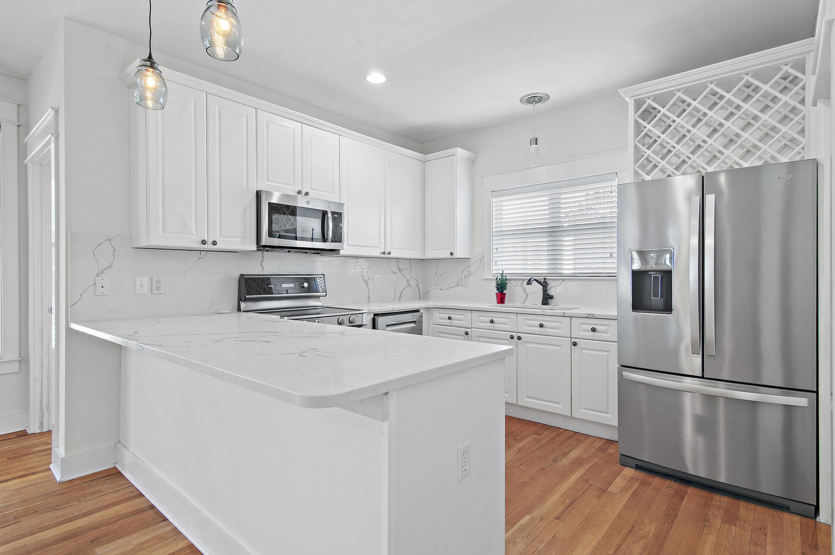 158 Cullman Avenue Santa Rosa Beach, FL 32459 - Photo 15 of 47 a kitchen with stainless steel appliances a refrigerator sink and microwave