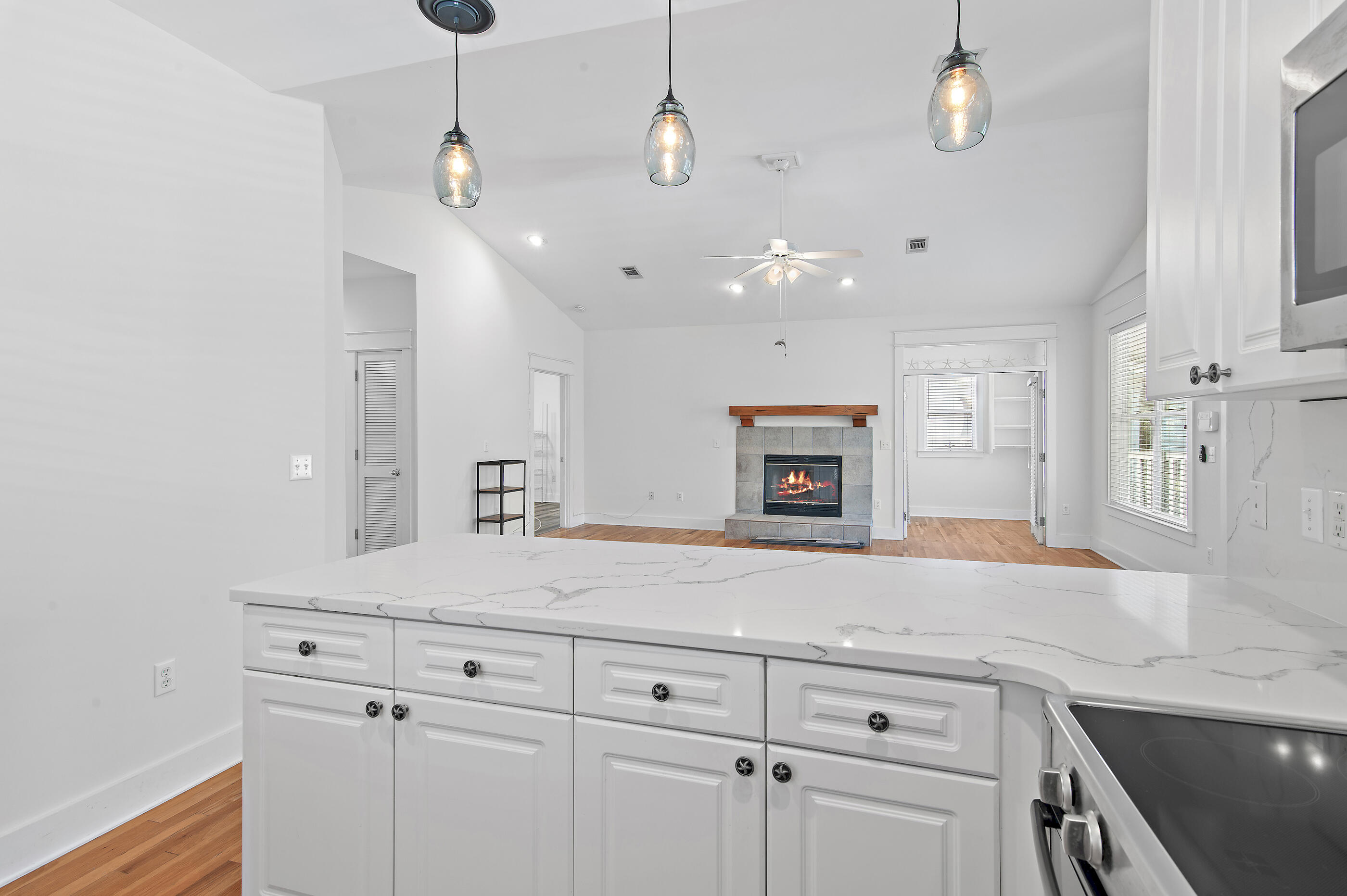 158 Cullman Avenue Santa Rosa Beach, FL 32459 - Photo 16 of 47 a view of a center island and chandelier