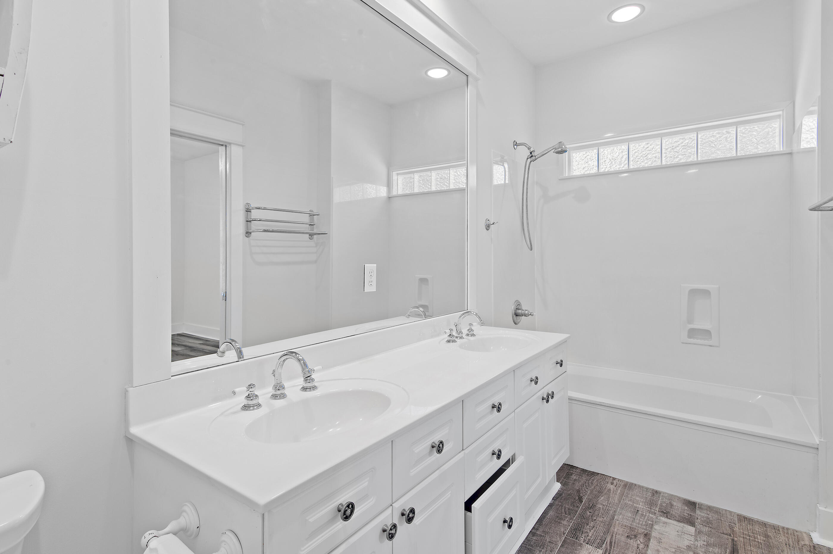 158 Cullman Avenue Santa Rosa Beach, FL 32459 - Photo 21 of 47 a bathroom with a sink double vanity granite tub shower and a mirror