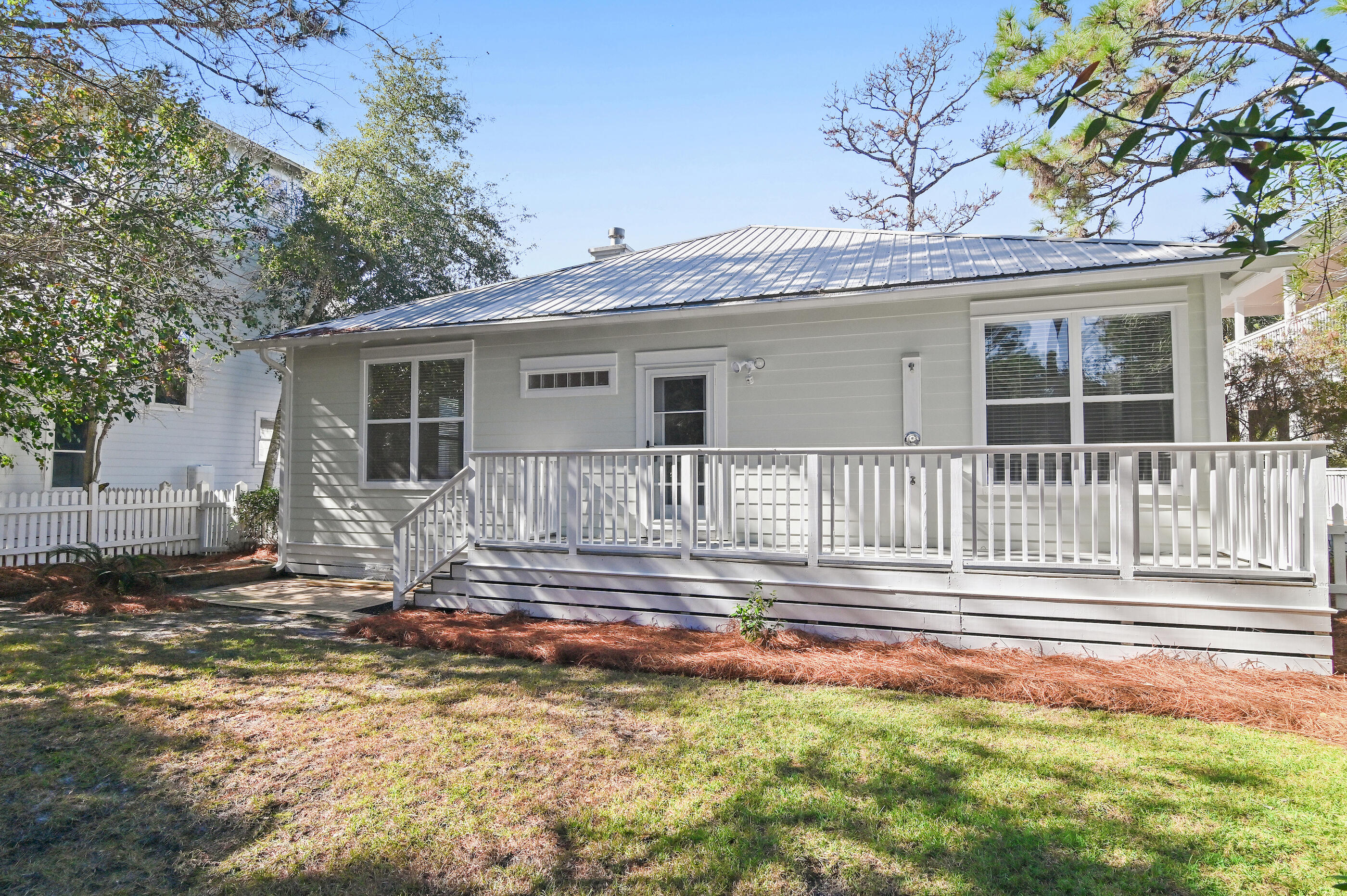 158 Cullman Avenue Santa Rosa Beach, FL 32459 - Photo 26 of 47 a front view of a house with a yard