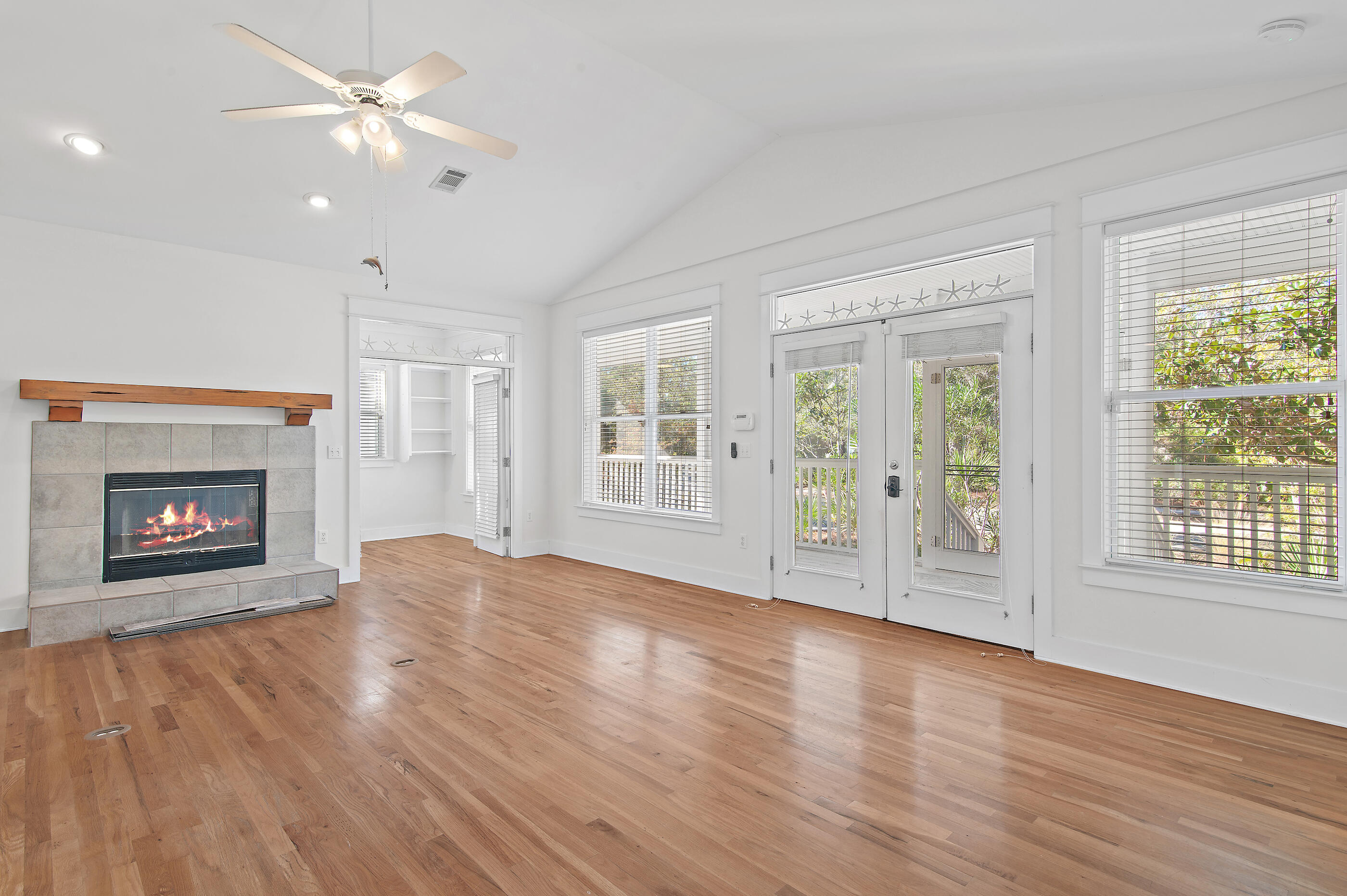 158 Cullman Avenue Santa Rosa Beach, FL 32459 - Photo 8 of 47 a view of an empty room with a window and fireplace