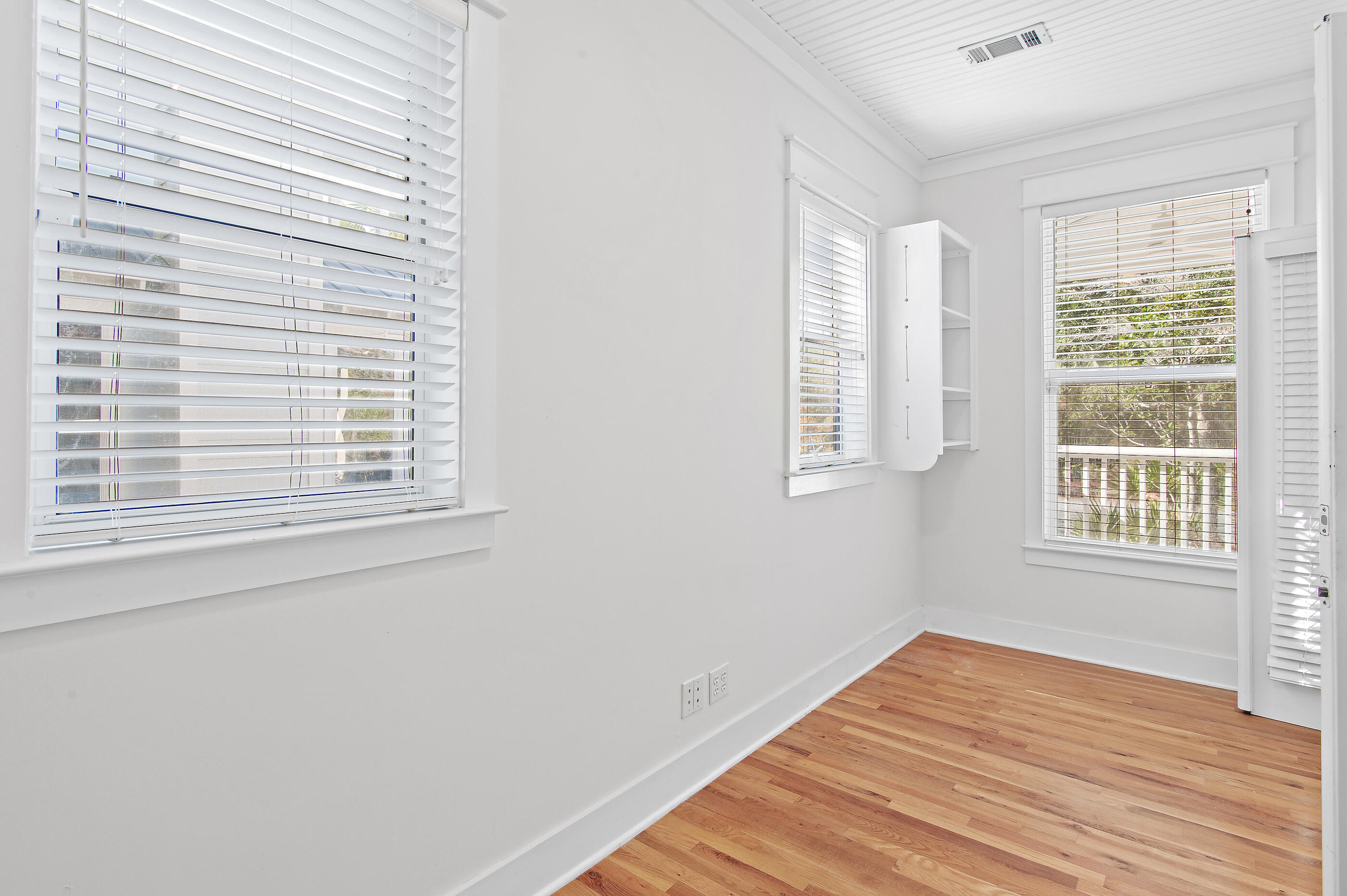 158 Cullman Avenue Santa Rosa Beach, FL 32459 - Photo 10 of 47 a view of a room with wooden floor and windows