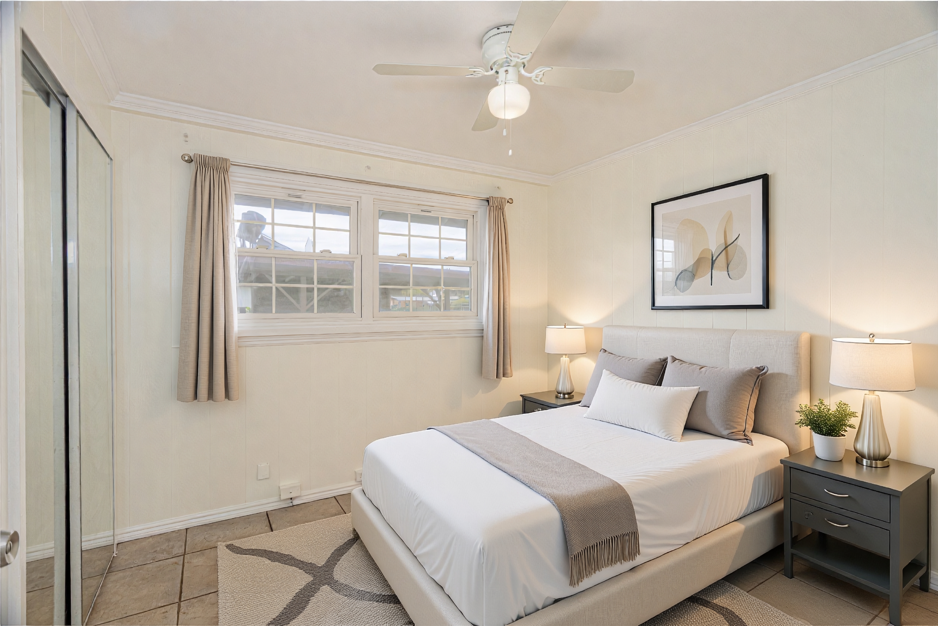 4580 Mamane Street Kapaa, HI 96746 - Photo 9 of 30 a bedroom with a large bed and a window