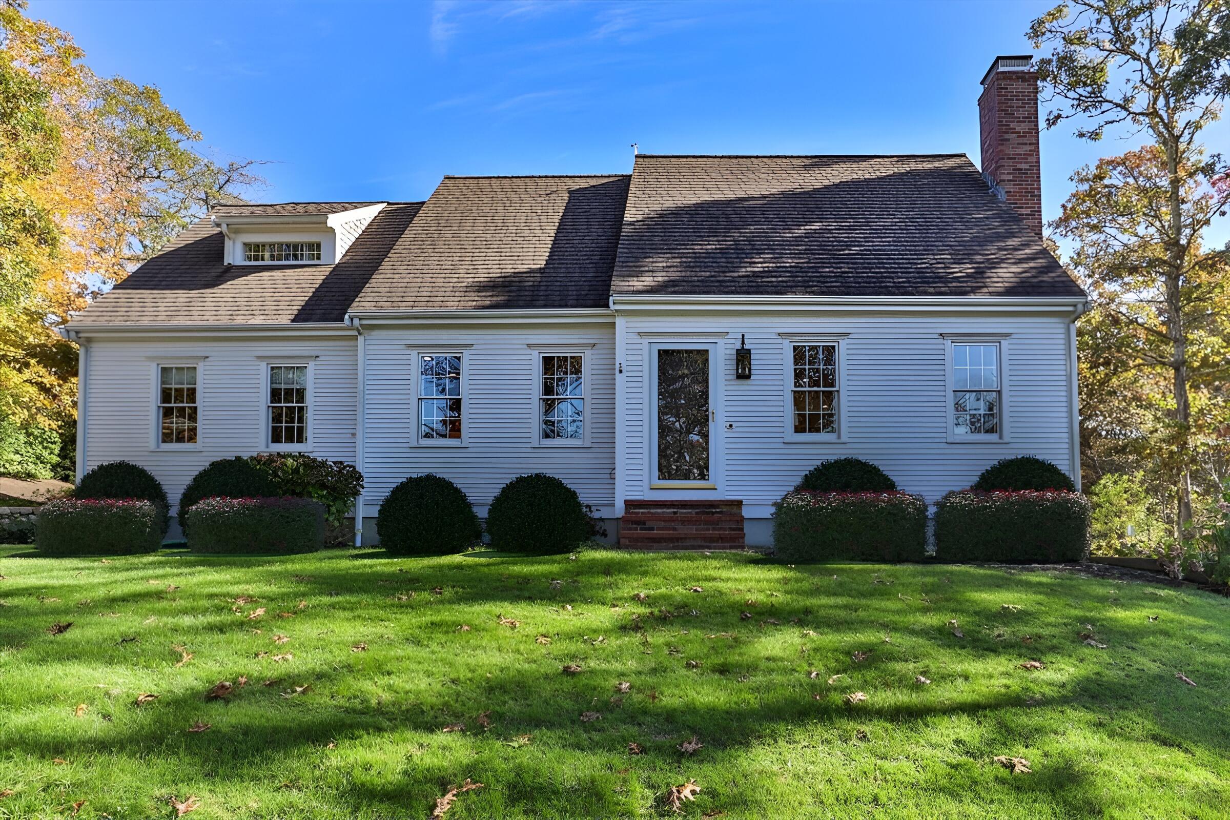 102 Gorham Road Harwich Port, MA 02646 - Photo 1 of 64 a view of a house with a backyard