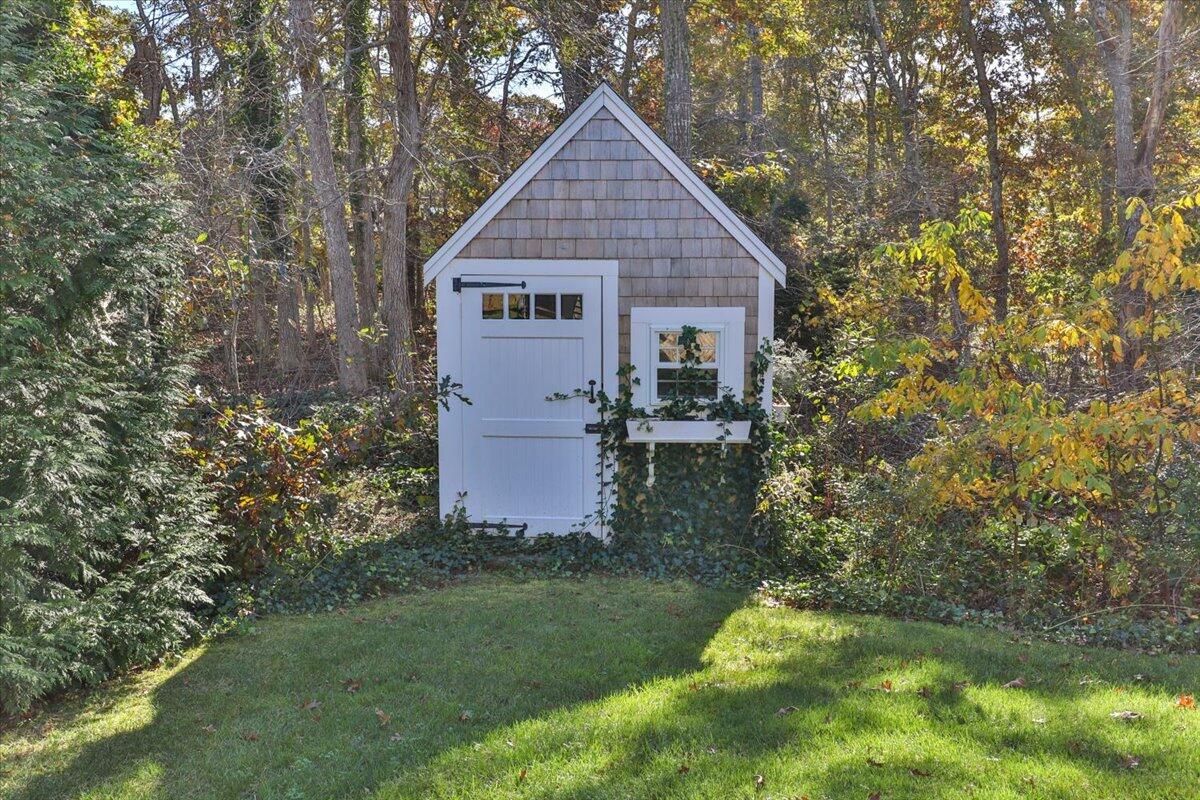 102 Gorham Road Harwich Port, MA 02646 - Photo 13 of 64 a view of a house with backyard