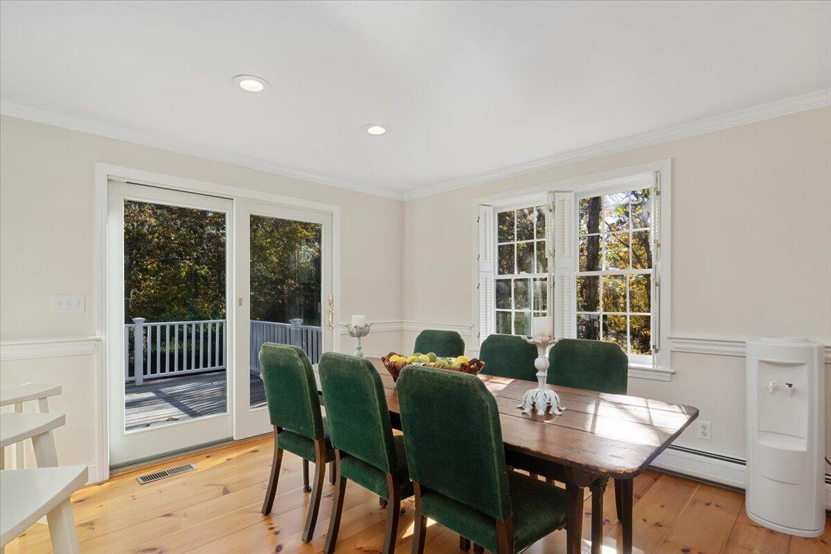 102 Gorham Road Harwich Port, MA 02646 - Photo 23 of 64 a view of a dining room with furniture window and outside view