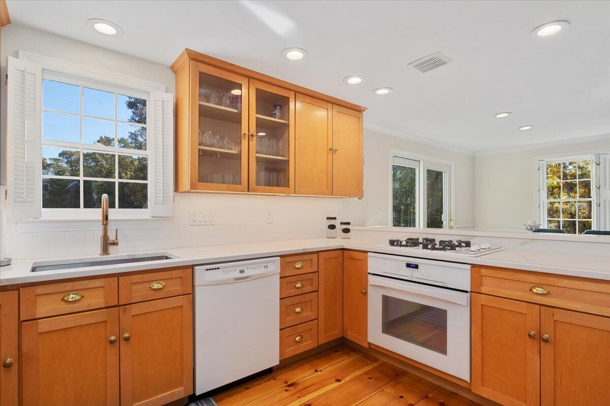 102 Gorham Road Harwich Port, MA 02646 - Photo 26 of 64 a kitchen with granite countertop cabinets stainless steel appliances and a sink