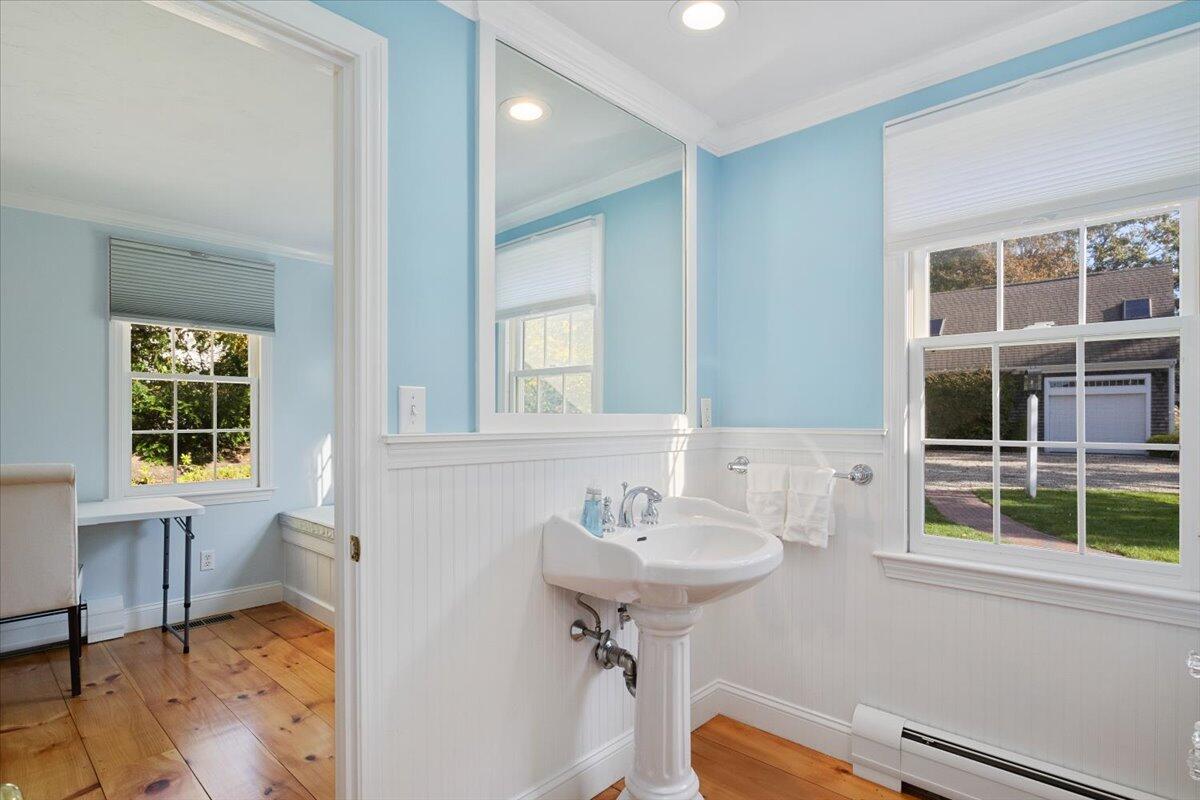 102 Gorham Road Harwich Port, MA 02646 - Photo 36 of 64 a bathroom with a sink a window and a mirror