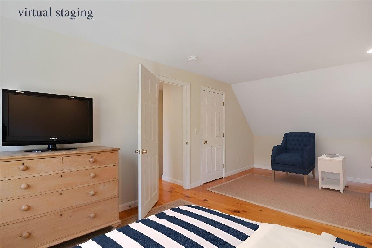 102 Gorham Road Harwich Port, MA 02646 - Photo 44 of 64 a bedroom with a bed and flat screen tv