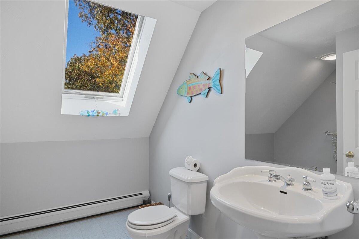 102 Gorham Road Harwich Port, MA 02646 - Photo 53 of 64 a white toilet sitting next to a white sink