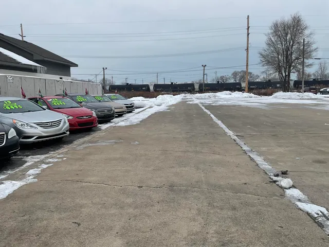a view of a street with cars