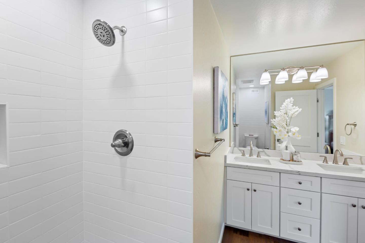 8 Cassandra Way Mountain View, CA 94043 - Photo 27 of 35 a bathroom with a double vanity sink mirror and shower