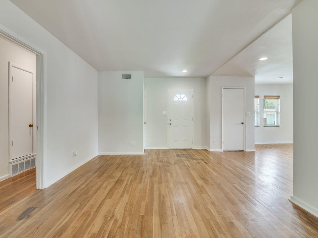 2315 Inadale Avenue Dallas, TX 75228 - Photo 3 of 36 wooden floor in an empty room with a window
