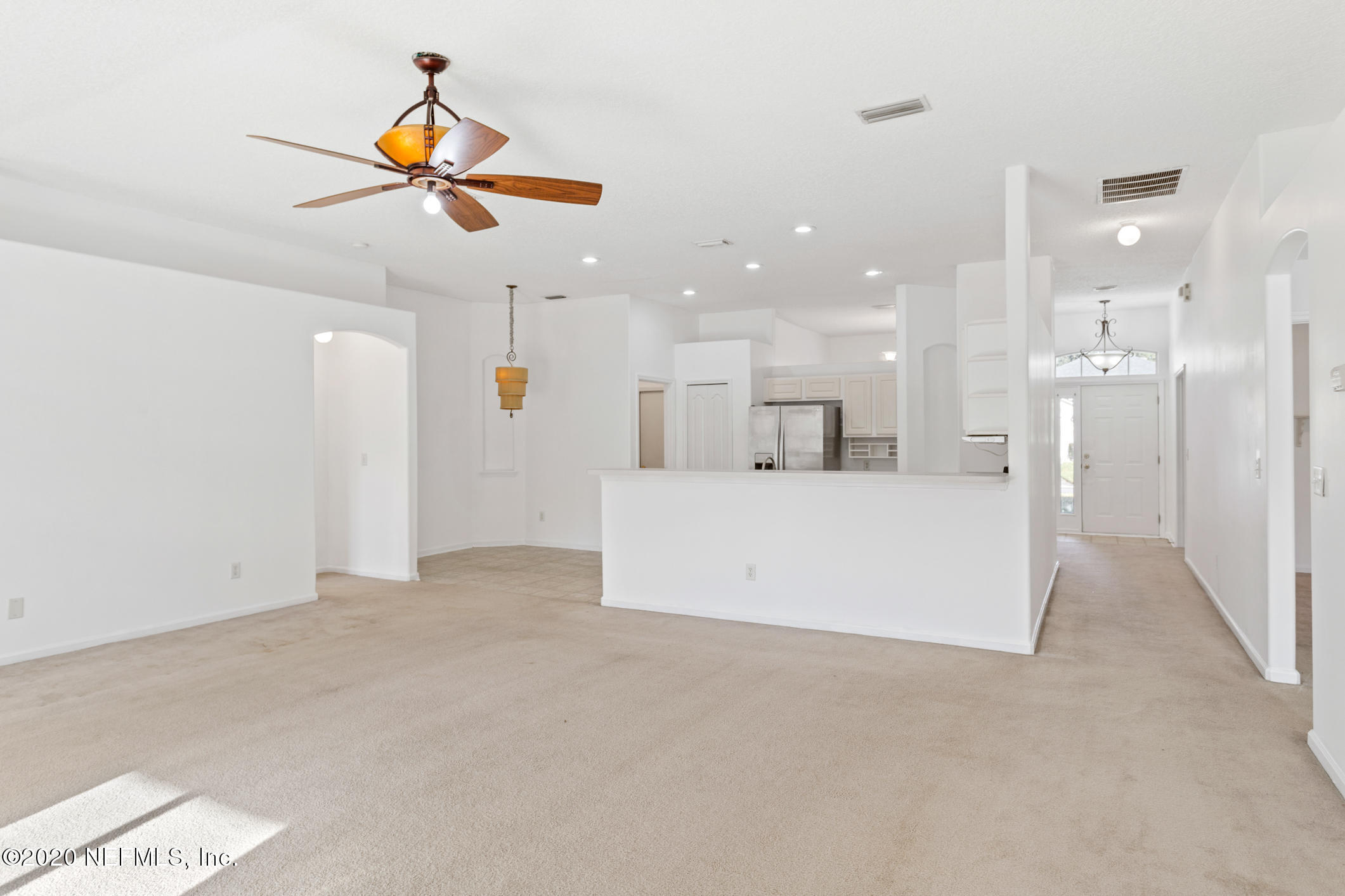 2514 Paris Mill Road Jacksonville, FL 32221 - Photo 14 of 29 a view of a kitchen and a chandelier fan