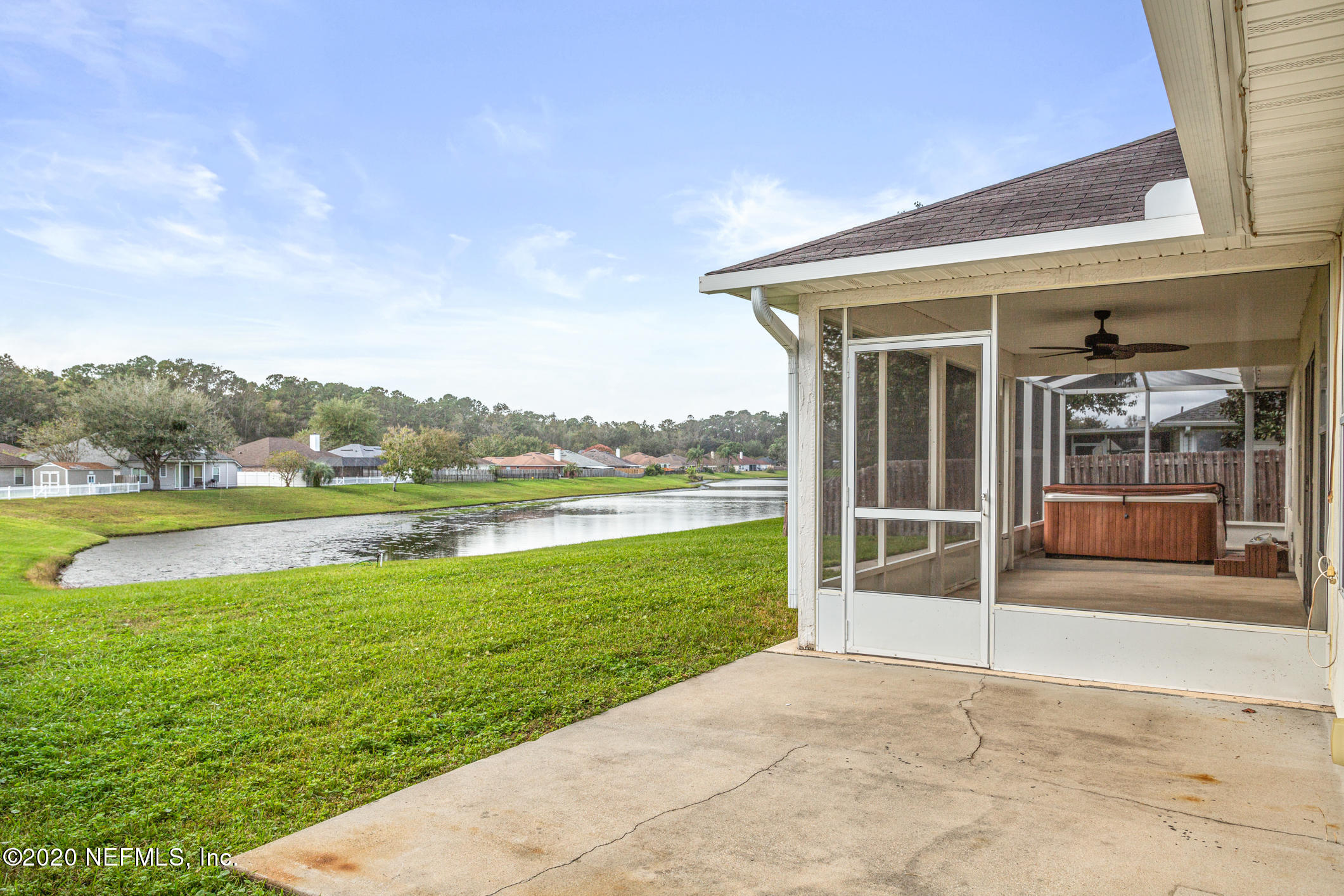 2514 Paris Mill Road Jacksonville, FL 32221 - Photo 27 of 29 a view of a house with a swimming pool and a yard