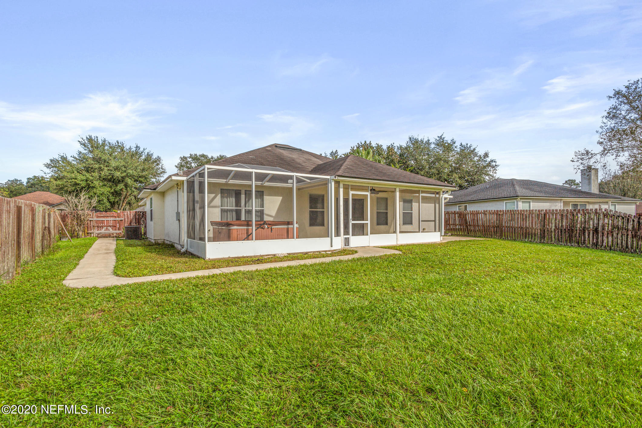 2514 Paris Mill Road Jacksonville, FL 32221 - Photo 28 of 29 a view of a house with a yard and sitting area