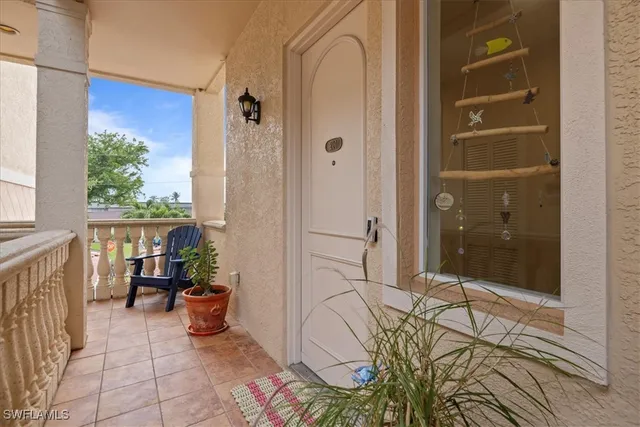 a open kitchen with stainless steel appliances granite countertop a stove and a view of living room