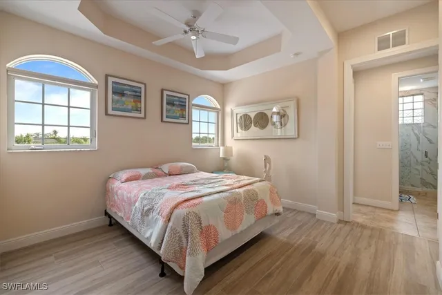 an aerial view of a house with outdoor space lake view and houses