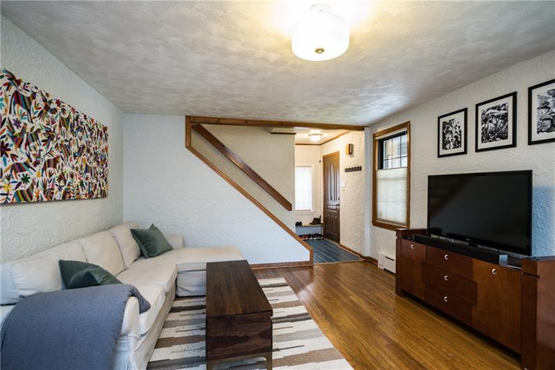 2931 Fernwald Road Pittsburgh, PA 15217 - Photo 3 of 22 The spacious living room is a perfect place to enjoy the big screen TV.