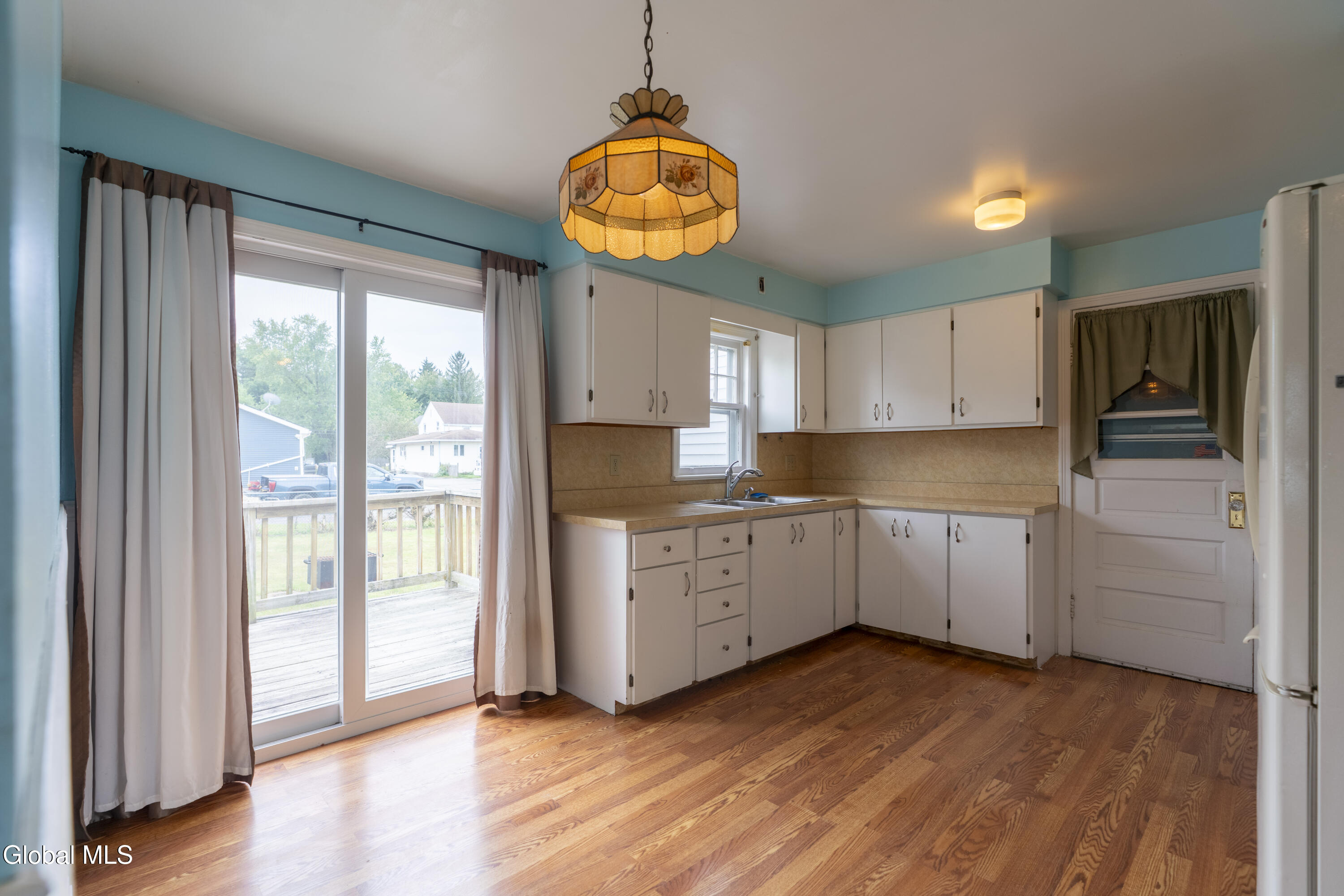319 Princetown Road Rotterdam, NY 12306 - Photo 8 of 26 kitchen w/ new sliding door