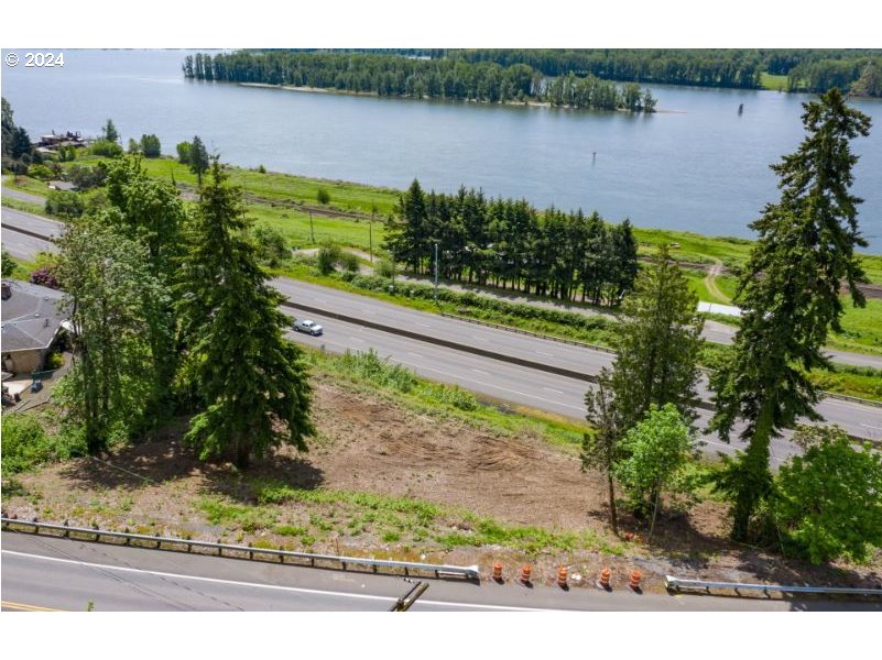 580 Northwest Brady Road Camas, WA 98607 - Photo 1 of 7 a view of a lake from a yard