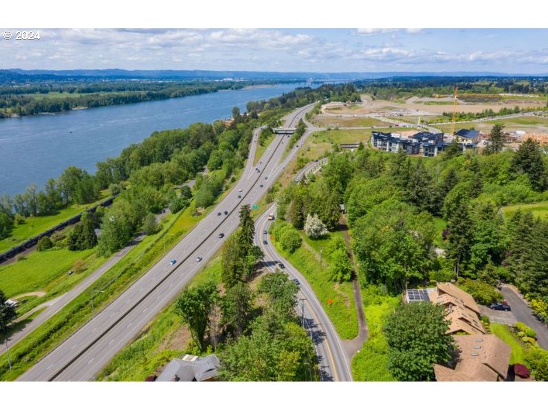 580 Northwest Brady Road Camas, WA 98607 - Photo 2 of 7 a view of a lake with a yard