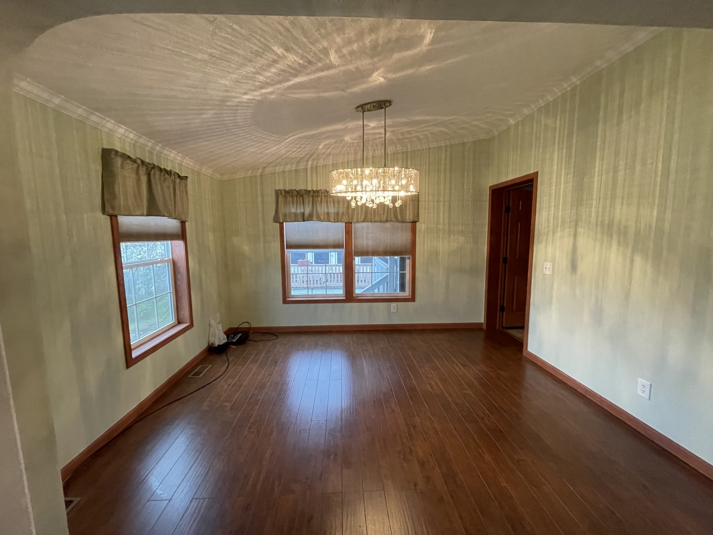 67 Crocus Lane Matteson, IL 60443 - Photo 11 of 30 wooden floor in an empty room with a window
