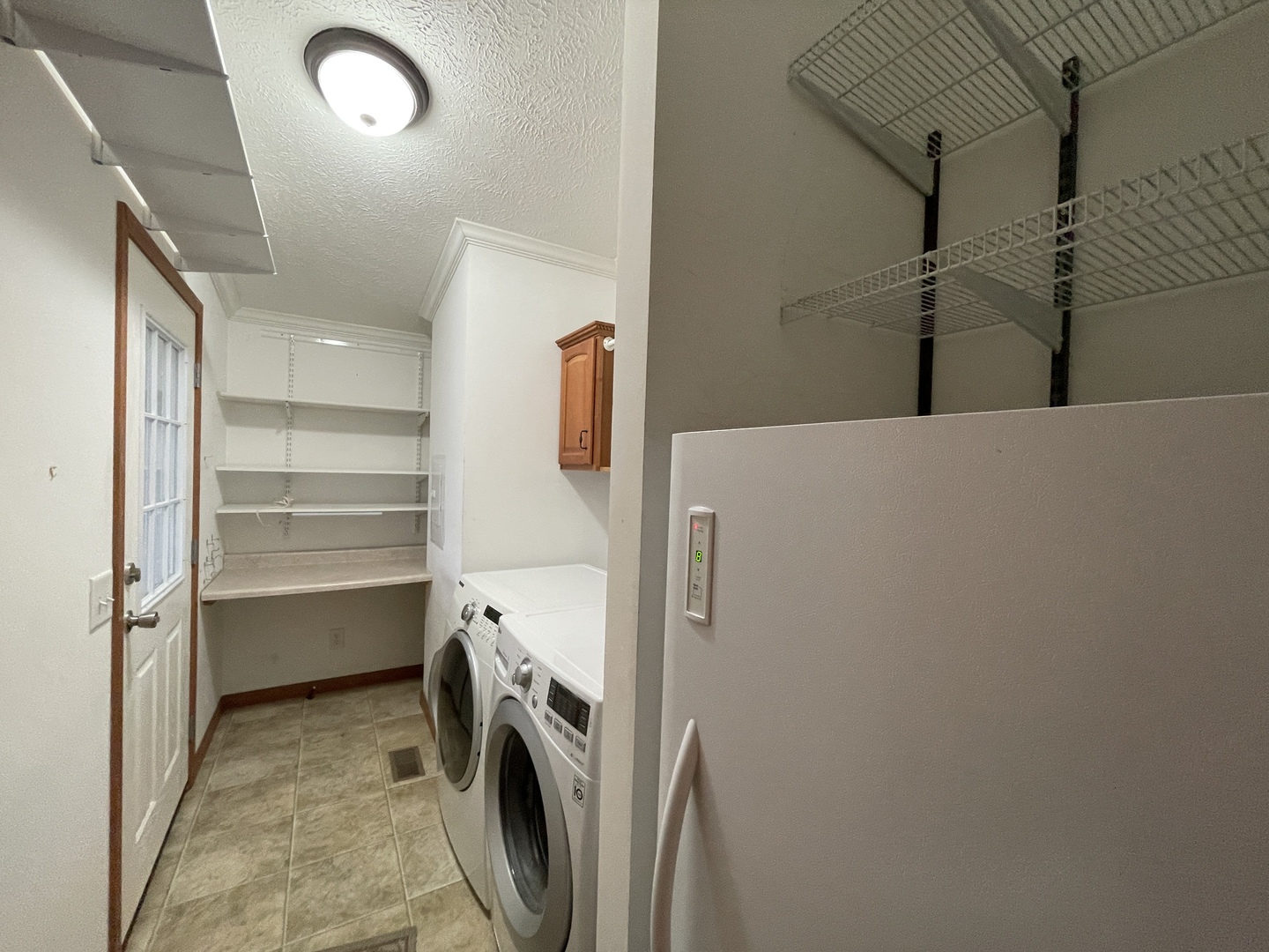 67 Crocus Lane Matteson, IL 60443 - Photo 13 of 30 a view of storage and utility room with washer and dryer