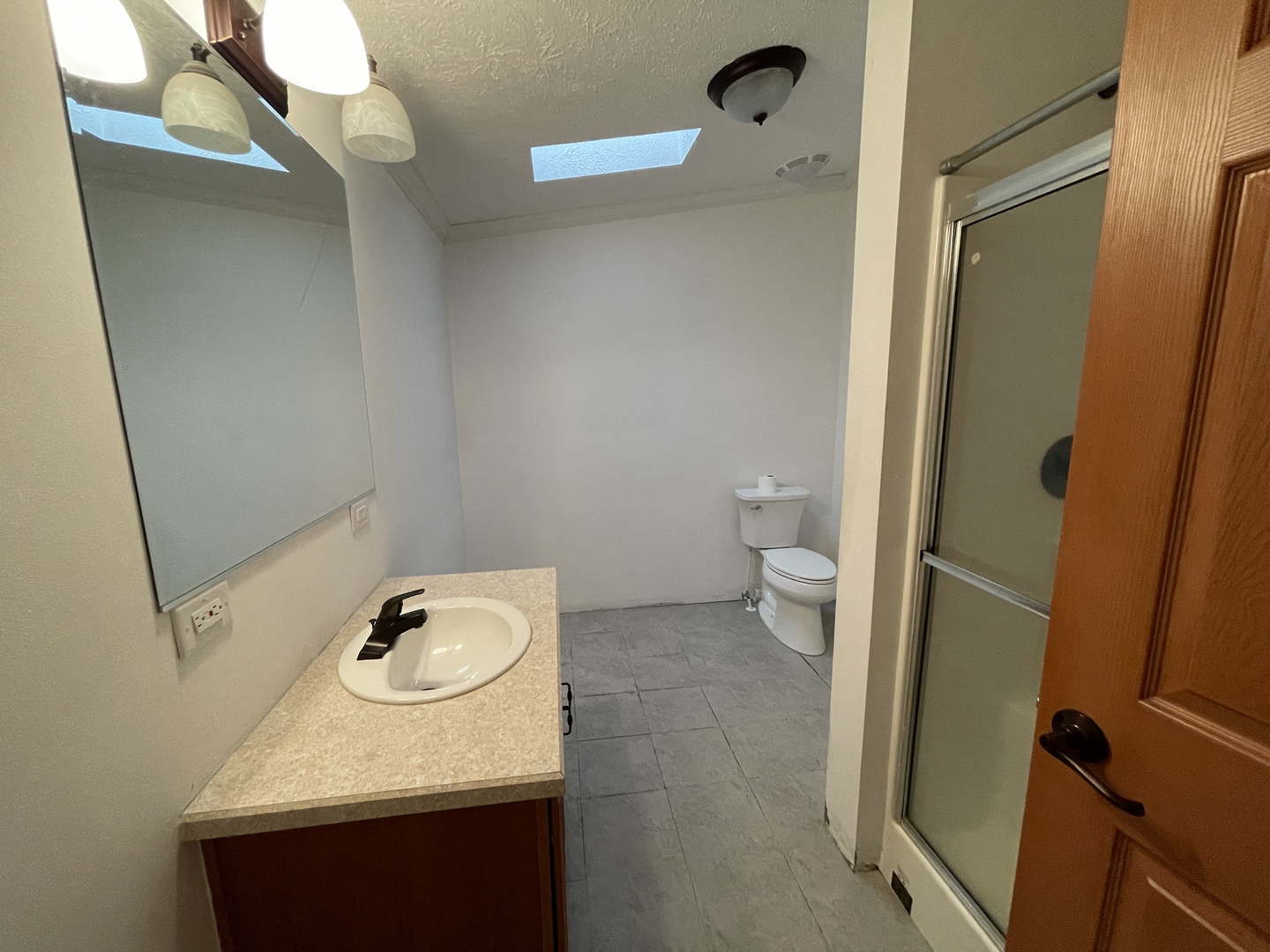 67 Crocus Lane Matteson, IL 60443 - Photo 17 of 30 a bathroom with a sink and toilet