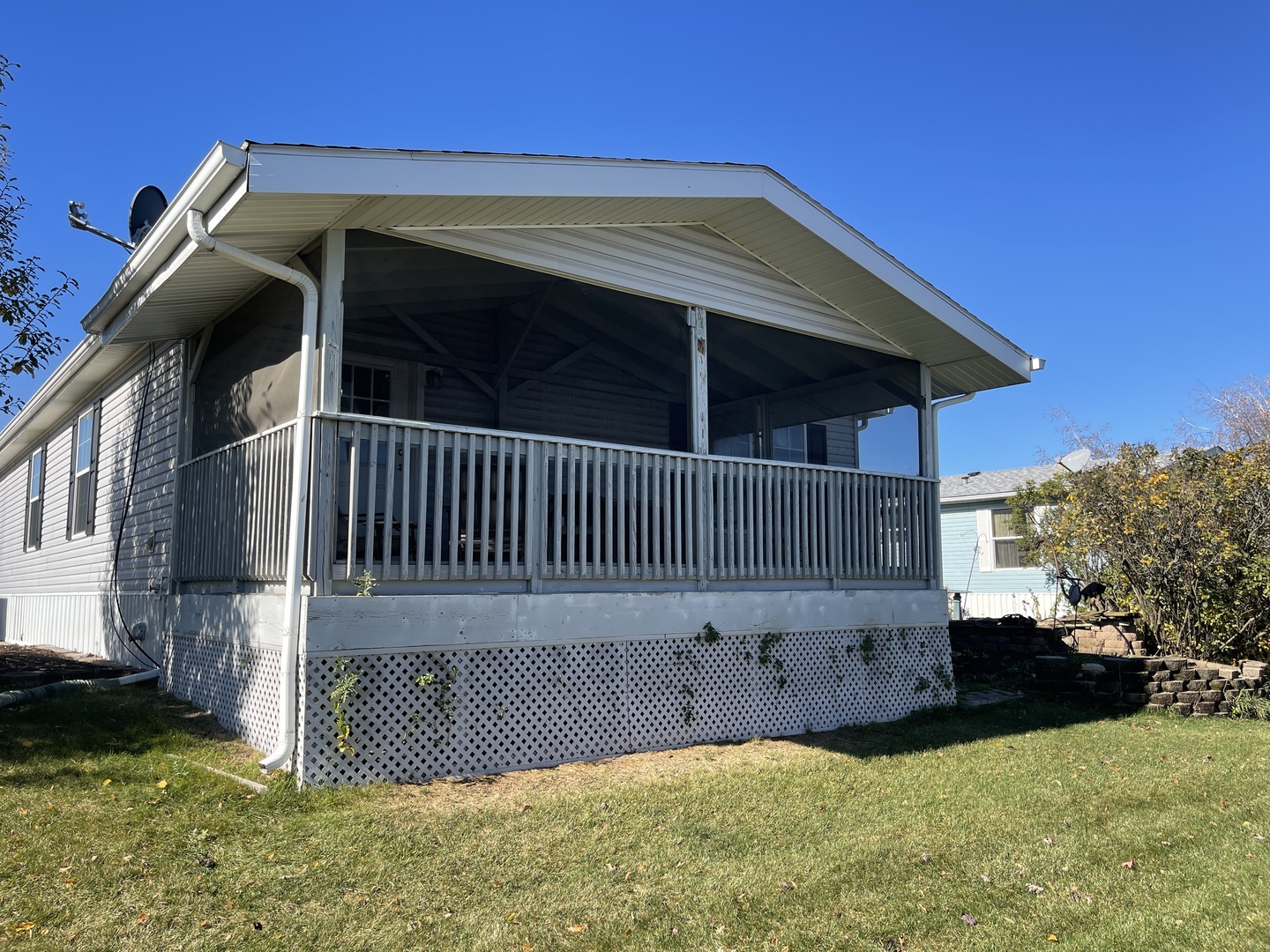 67 Crocus Lane Matteson, IL 60443 - Photo 2 of 30 a view of backyard with small cabin and wooden fencing