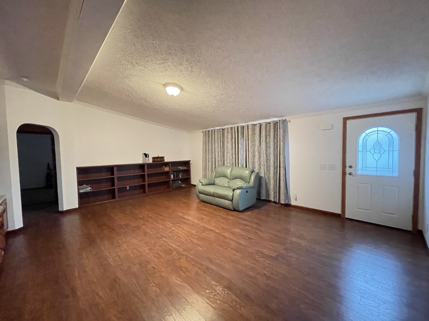 67 Crocus Lane Matteson, IL 60443 - Photo 22 of 30 a living room with furniture and a wooden floor