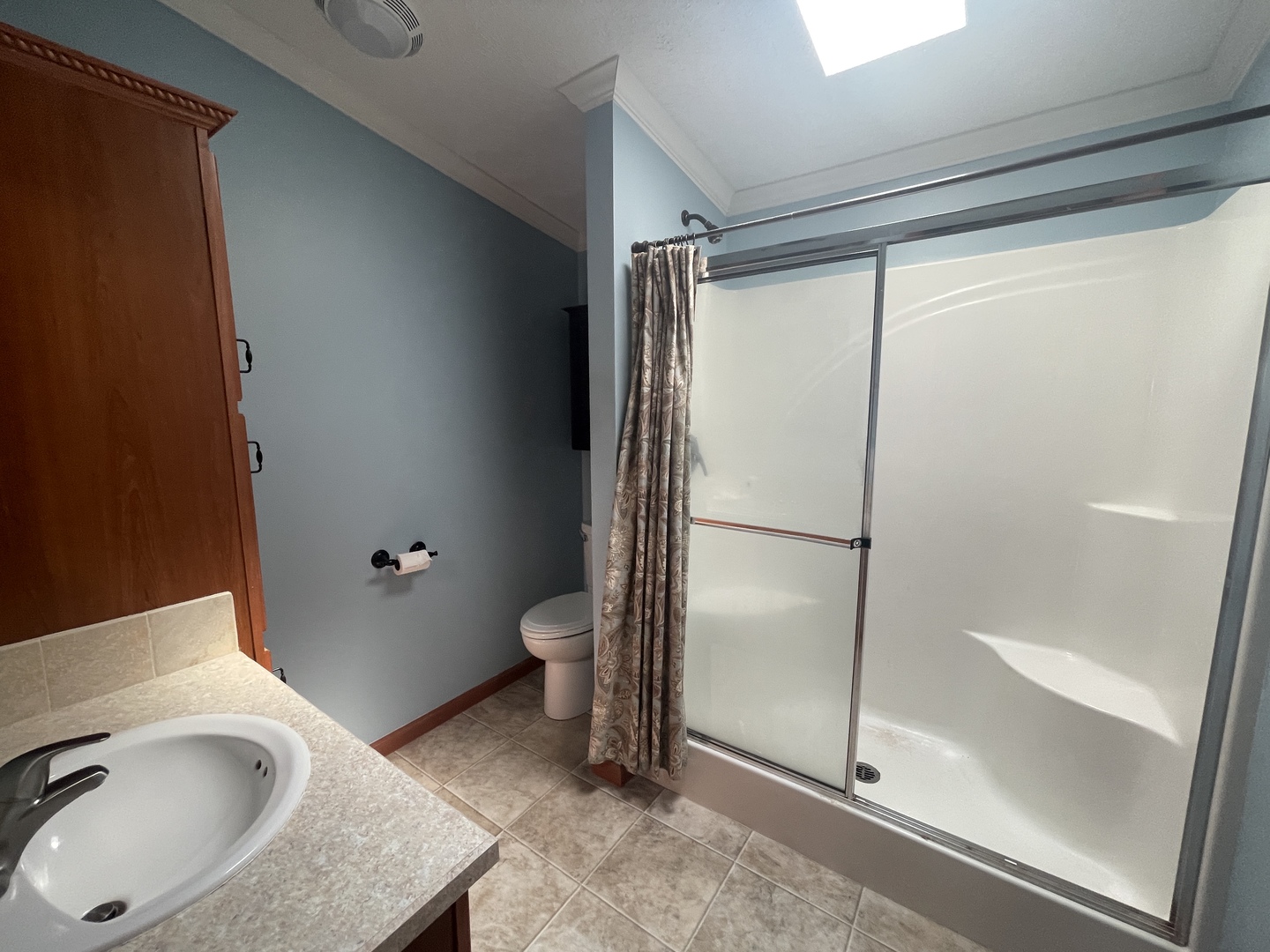 67 Crocus Lane Matteson, IL 60443 - Photo 24 of 30 a bathroom with a granite countertop sink toilet and shower