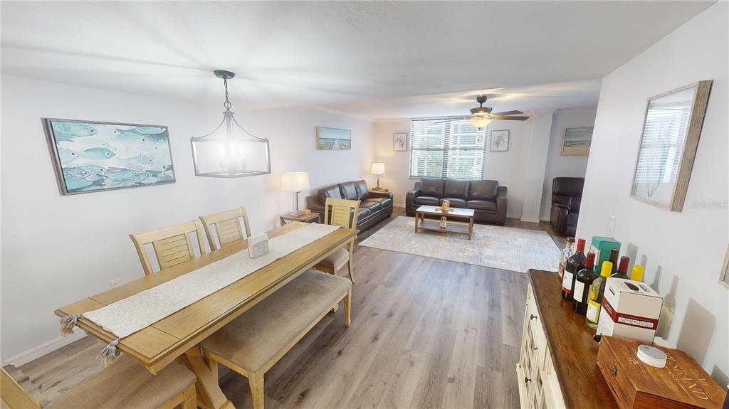 8735 Midnight Pass Road, Unit 206B Sarasota, FL 34242 - Photo 18 of 56 a living room with furniture