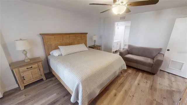 a bathroom with a sink a mirror and a vanity