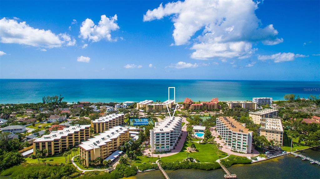 8735 Midnight Pass Road, Unit 206B Sarasota, FL 34242 - Photo 5 of 56 a view of a city with an ocean