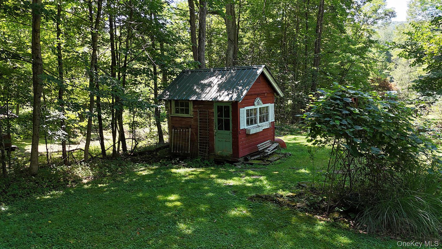 66 Raspberry Park Road Long Eddy, NY 12760 - Photo 11 of 36 View of shed with a wooded view