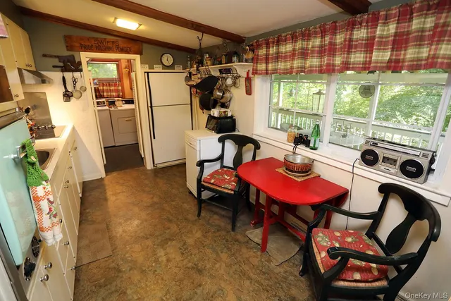 a room with furniture and a window