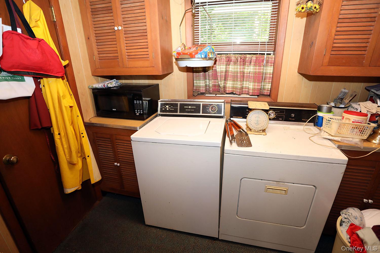 66 Raspberry Park Road Long Eddy, NY 12760 - Photo 17 of 36 Laundry area featuring washer and clothes dryer and cabinet space