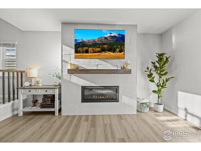 a view of a room with furniture and window