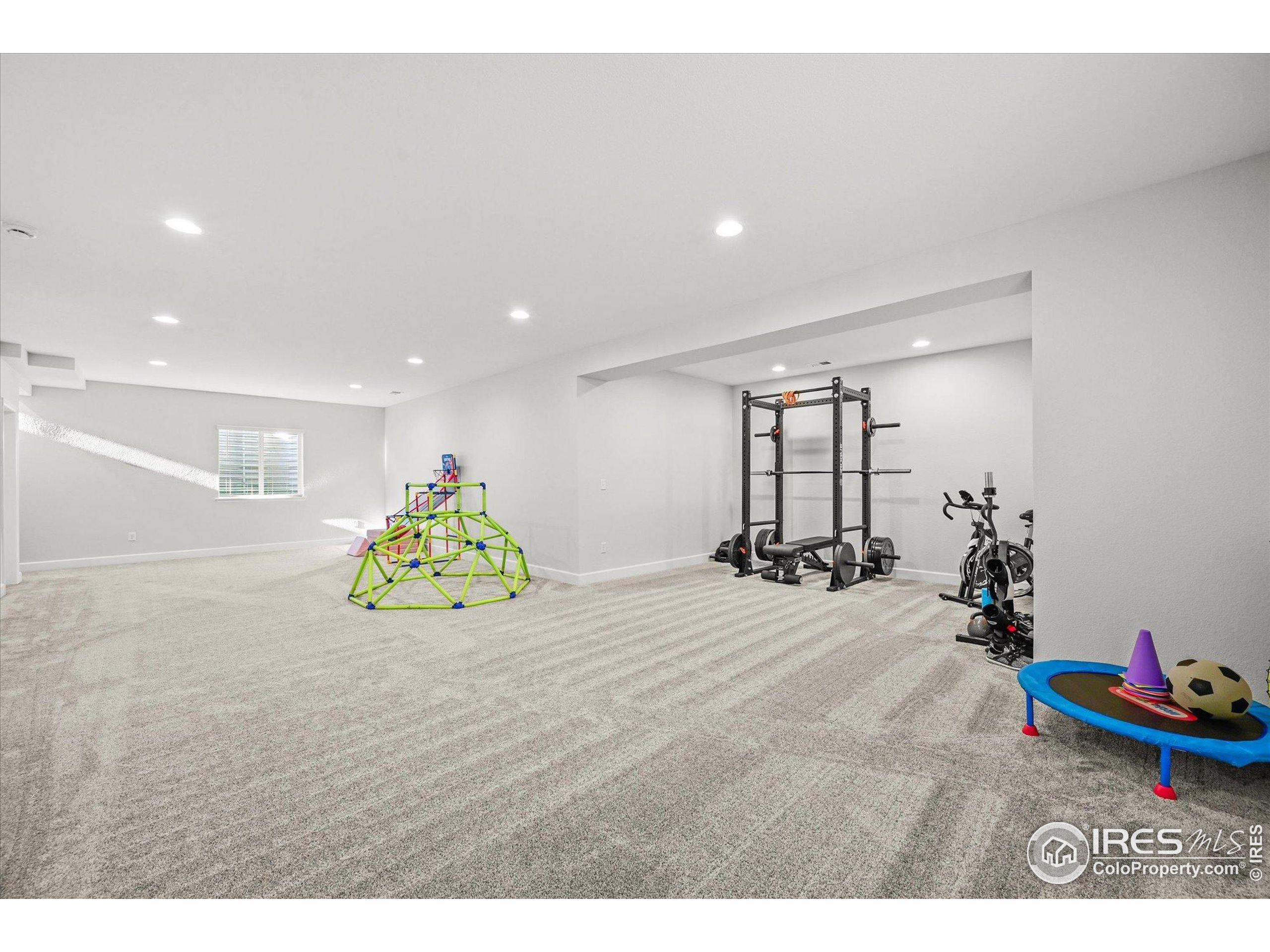 950 Rustling Street Windsor, CO 80550 - Photo 37 of 49 a view of a room with gym equipment