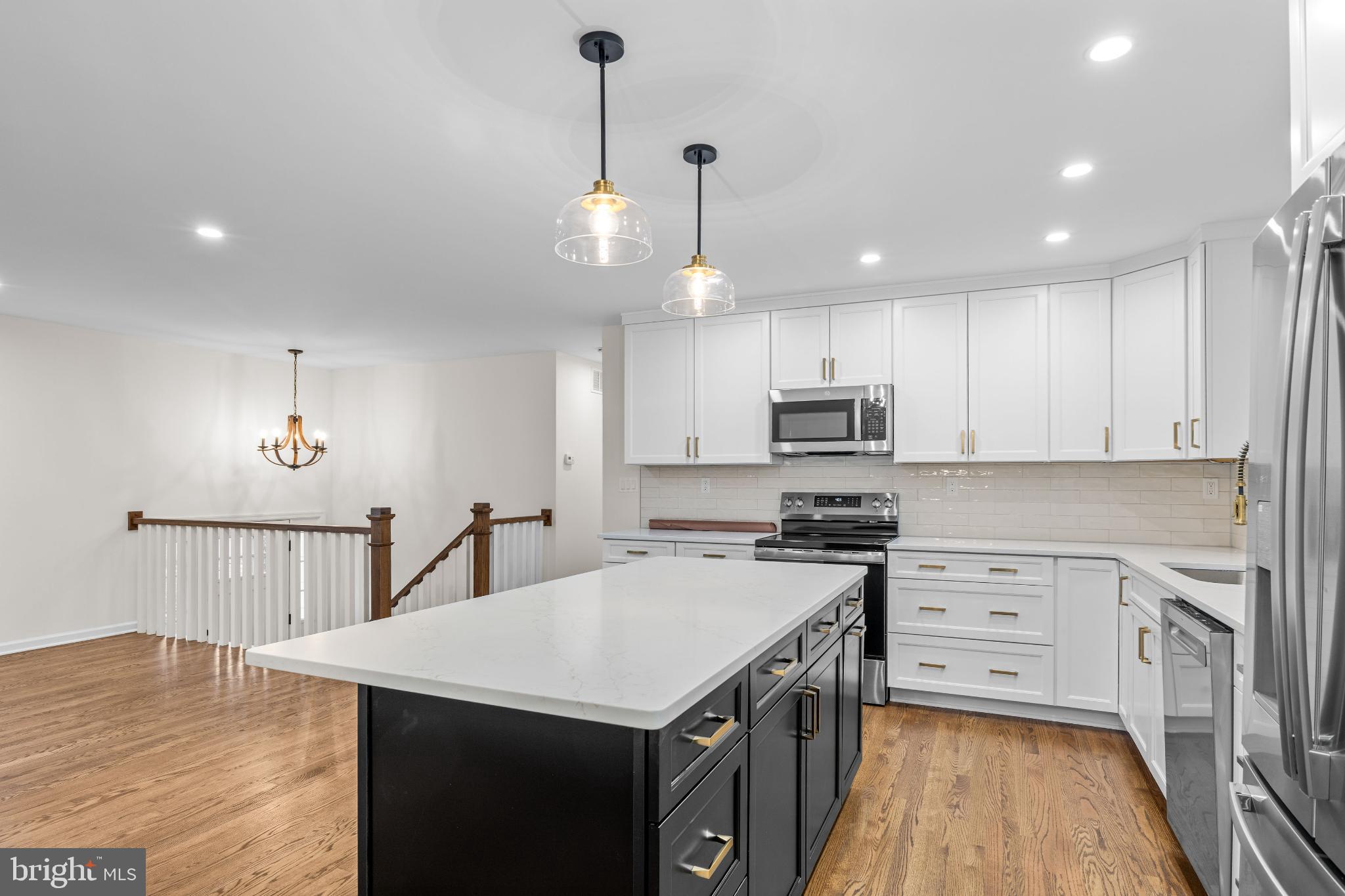 1031 Old Bay Ridge Road Annapolis, MD 21403 - Photo 14 of 48 Modern kitchen with sleek design elements.