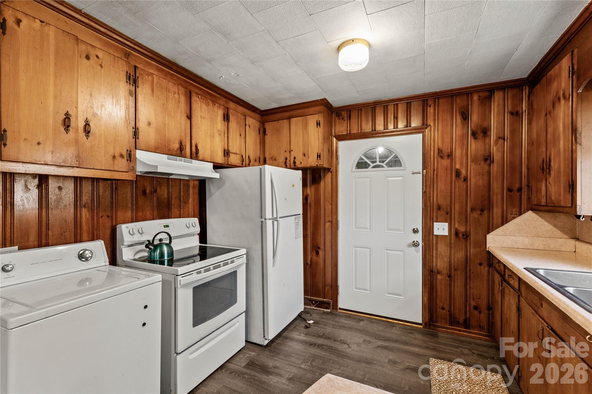 1724 State Rd S-29-39 Lancaster, SC 29720 - Photo 15 of 29 a kitchen with a refrigerator and a stove