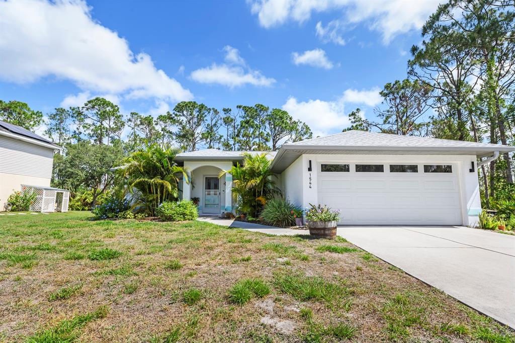 front view of house with a yard