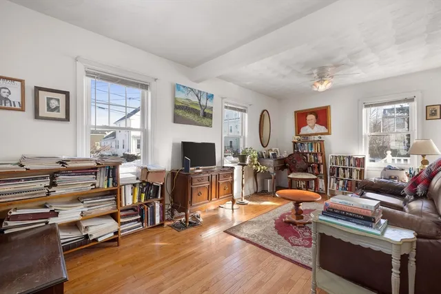 a kitchen with stainless steel appliances granite countertop a refrigerator and a stove