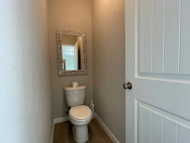 a bathroom with a toilet