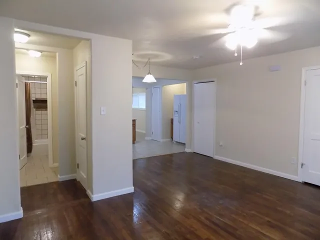 a kitchen that has a sink and a stove in it