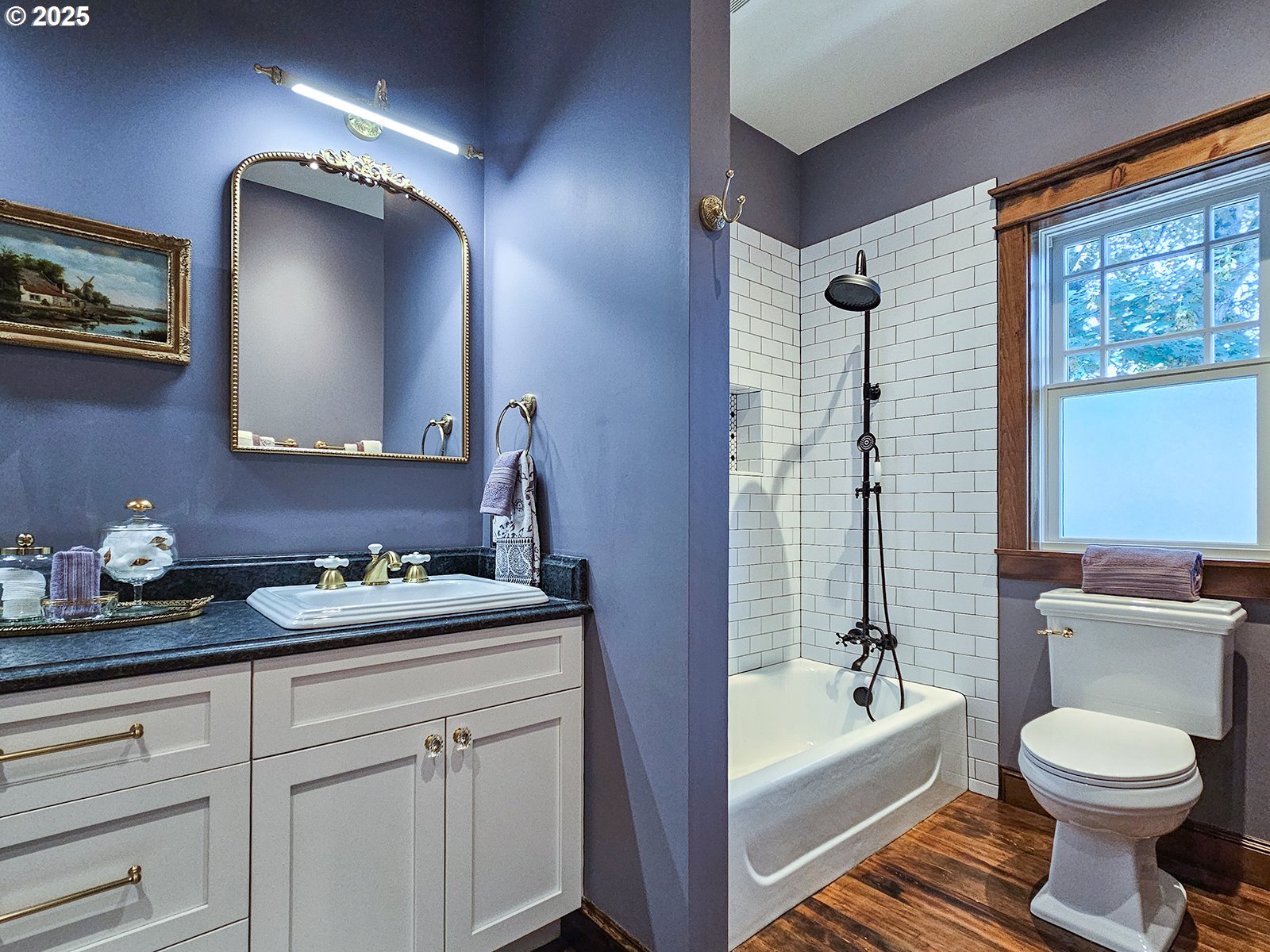 4725 Northeast 22nd Avenue Portland, OR 97211 - Photo 18 of 46 a bathroom with a sink a toilet and bathtub