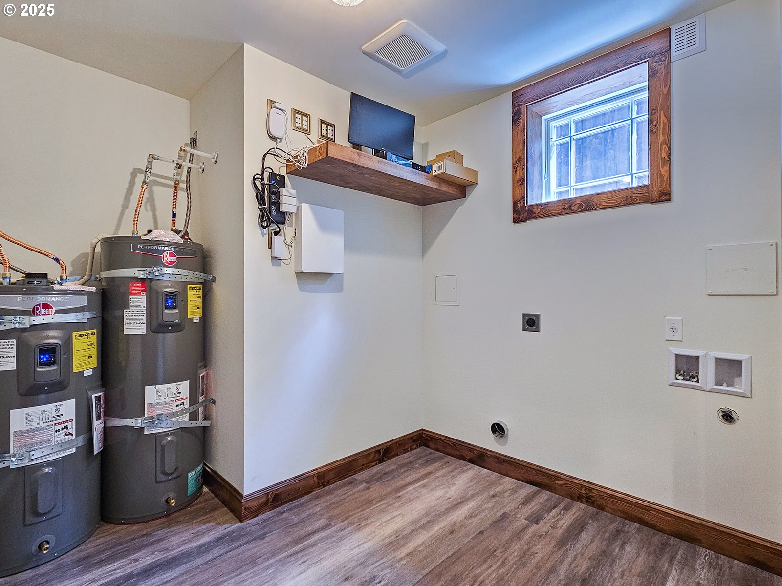 4725 Northeast 22nd Avenue Portland, OR 97211 - Photo 31 of 46 a view of a hallway with workspace and wooden floor