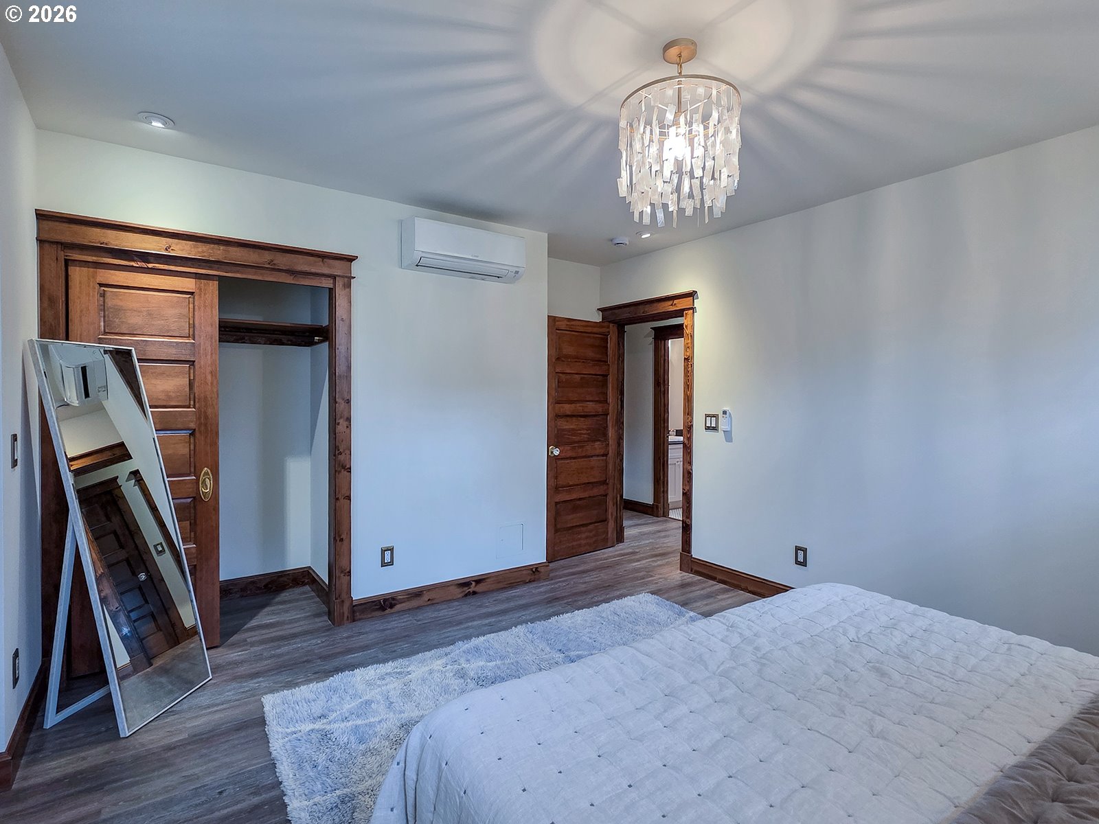 4725 Northeast 22nd Avenue Portland, OR 97211 - Photo 33 of 46 a bedroom with bed and wooden floor